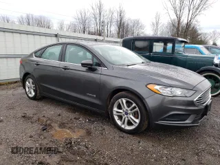 2018 Ford Fusion Hybrid SE with VIN 3FA6P0LU9JR261090, listed as a Copart auction lot 73309152 with 147,699 mi miles. Bid and sale history available at carsss.com. Image 4.
