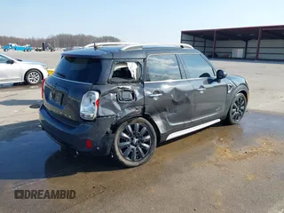 2018 MINI Countryman Cooper S with VIN WMZYT5C3XJ3E60685, listed as a IAAI auction lot 41775049 with 125,883 mi miles and . Bid and sale history available at DreamBid. Image 4.