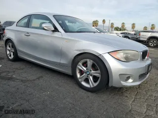 2013 BMW 1 Series 128i with VIN WBAUP9C56DVS95894, listed as a Copart auction lot 85974744 with 119,033 mi miles and Clean Title. Bid and sale history available at carsss.com. Image 4.