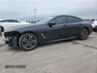 2022 BMW 8 Series 840i z VIN WBAGV4C01NCH18603, wystawiony jako Copart lot #51969445 z przebiegiem 19 502 mil mil oraz Tytuł czysty. Historia ofert i sprzedaży dostępna na DreamBid. Obrazek 1.