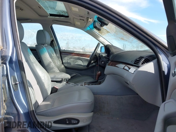 2004 BMW 3 Series 325i with VIN WBAAZ33434KP83350, listed as a IAAI auction lot 41993657 with 123,867 mi miles. Bid and sale history available at carsss.com. Image 5.