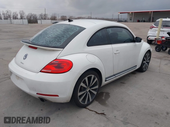 2012 Volkswagen Beetle Turbo with VIN 3VWVA7AT3CM650301, listed as a IAAI auction lot 41525503 with Not Provided miles and . Bid and sale history available at DreamBid. Image 4.