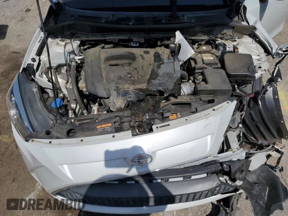 2019 Toyota Yaris L z VIN 3MYDLBYV7KY519027, wystawiony jako Copart lot #57104345 z przebiegiem Nie podano mil oraz Szkoda całkowita • Salvage title. Historia ofert i sprzedaży dostępna na DreamBid. Obrazek 11.