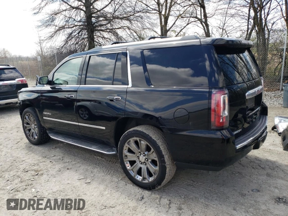 2015 GMC Yukon Denali with VIN 1GKS2CKJXFR702247, listed as a Copart auction lot 51648175 with 151,936 mi miles and Salvage Title. Bid and sale history available at carsss.com. Image 2.