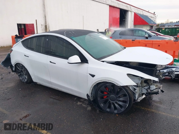 2021 Tesla Model Y Performance z VIN 5YJYGDEF2MF133739, wystawiony jako IAAI lot #41226429 z przebiegiem 58 502 mil mil oraz . Historia ofert i sprzedaży dostępna na DreamBid. Obrazek 1.