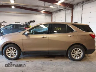 2018 Chevrolet Equinox LT with VIN 2GNAXJEV5J6232085, listed as a IAAI auction lot 41913104 with 112,938 mi miles and . Bid and sale history available at DreamBid. Image 14.
