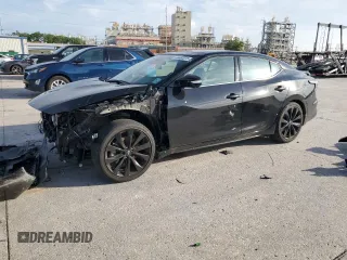 2023 Nissan Maxima SR z VIN 1N4AA6EV8PC505713, wystawiony jako Copart lot #56562075 z przebiegiem 16 413 mil mil oraz Szkoda całkowita • Salvage title. Historia ofert i sprzedaży dostępna na DreamBid. Obrazek 1.