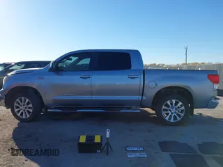 2012 Toyota Tundra 4WD Truck LTD with VIN 5TFHW5F18CX251584, listed as a IAAI auction lot 41054238 with 124,892 mi miles. Bid and sale history available at carsss.com. Image 14.