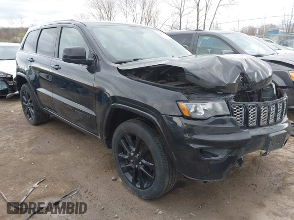2017 Jeep Grand Cherokee Laredo with VIN 1C4RJFAG7HC886640, listed as a IAAI auction lot 42035301 with 197,110 mi miles. Bid and sale history available at carsss.com. Image 1.