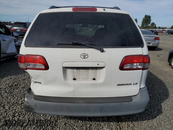 2001 Toyota Sienna LE with VIN 4T3ZF13C61U362980, listed as a Copart auction lot 71986484 with 188,556 mi miles and Salvage Title. Bid and sale history available at carsss.com. Image 6.