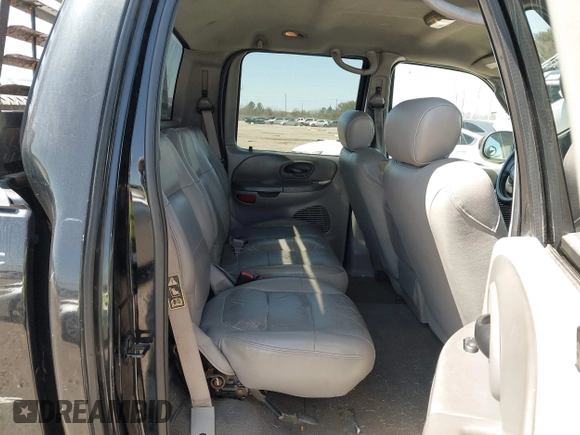 2003 Ford F-150 XLT with VIN 1FTRW07L43KB05221, listed as a IAAI auction lot 41762332 with 226,660 mi miles. Bid and sale history available at carsss.com. Image 8.