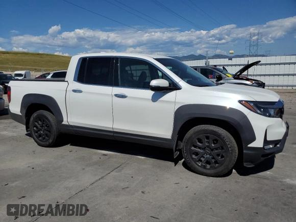 2023 Honda Ridgeline RTL-E with VIN 5FPYK3F76PB011963, listed as a Copart auction lot 63079165 with 25,658 mi miles and Salvage title. Bid and sale history available at DreamBid. Image 4.