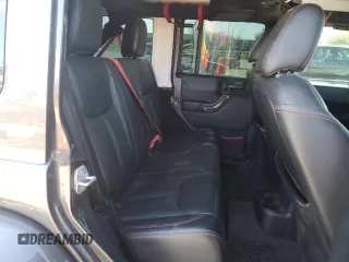 2017 Jeep Wrangler Unlimited Rubicon z VIN 1C4BJWFGXHL737844, wystawiony jako Copart lot #53044635 z przebiegiem 49 286 mil mil oraz Czysty tytuł • Clean title. Historia ofert i sprzedaży dostępna na DreamBid. Obrazek 11.