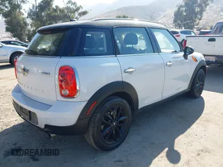 2013 MINI Countryman with VIN WMWZB3C56DWR35601, listed as a IAAI auction lot 42689147 with 80,024 mi miles and . Bid and sale history available at DreamBid. Image 4.