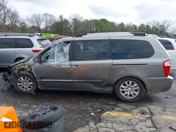 2010 Kia Sedona EX with VIN KNDMH4C33A6342127, listed as a IAAI auction lot 41570657 with 249,395 mi miles. Bid and sale history available at carsss.com. Image 14.