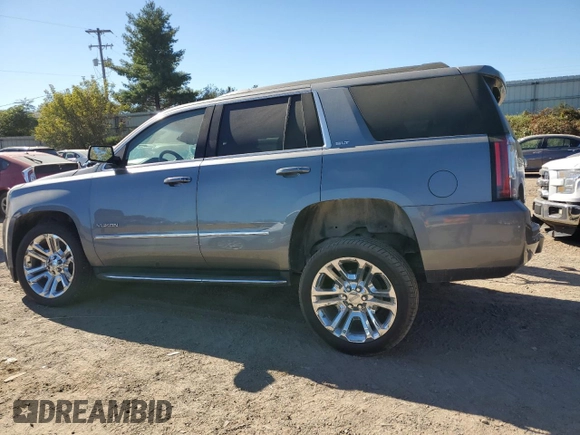 2019 GMC Yukon SLT with VIN 1GKS2BKC8KR103093, listed as a Copart auction lot 74321584 with 35,927 mi miles and Clean Title. Bid and sale history available at carsss.com. Image 2.