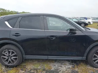 2018 Mazda CX-5 Touring with VIN JM3KFACM0J0315739, listed as a IAAI auction lot 40516262 with 60,727 mi miles. Bid and sale history available at carsss.com. Image 13.