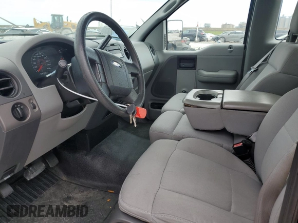 2006 Ford F-150 STX with VIN 1FTRF022X6KC52615, listed as a Copart auction lot 47594435 with 113,143 mi miles and Salvage Title. Bid and sale history available at carsss.com. Image 7.