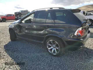 2005 BMW X5 4.8is with VIN 5UXFA93555LE83558, listed as a Copart auction lot 47374685 with 0 mi miles and Salvage Title. Bid and sale history available at carsss.com. Image 2.