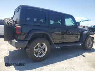 2020 Jeep Wrangler Unlimited Sahara with VIN 1C4HJXEN9LW247869, listed as a Copart auction lot 62697245 with 100,982 mi miles and Salvage title. Bid and sale history available at DreamBid. Image 3.