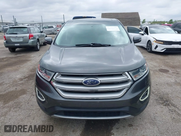 2015 Ford Edge Titanium z VIN 2FMTK3K81FBB88882, wystawiony jako IAAI lot #42184698 z przebiegiem 161 858 mil mil oraz . Historia ofert i sprzedaży dostępna na DreamBid. Obrazek 12.