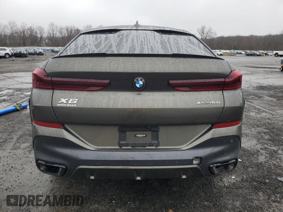 2023 BMW X6 xDrive40i z VIN 5UXCY6C03P9P48220, wystawiony jako Copart lot #51660845 z przebiegiem 24 947 mil mil oraz Szkoda całkowita • Salvage title. Historia ofert i sprzedaży dostępna na DreamBid. Obrazek 6.