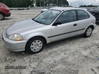 1998 Honda Civic DX z VIN 2HGEJ644XWH120512, wystawiony jako Copart lot #59639345 z przebiegiem 76 588 mil mil oraz Czysty tytuł • Clean title. Historia ofert i sprzedaży dostępna na DreamBid. Obrazek 1.