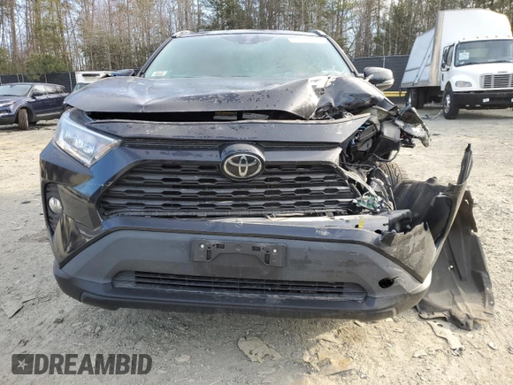 2020 Toyota RAV4 XLE with VIN 2T3P1RFV6LC101399, listed as a Copart auction lot 48256825 with 58,966 mi miles and Salvage Title. Bid and sale history available at DreamBid. Image 5.