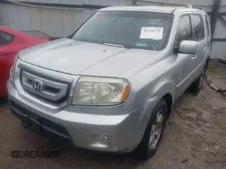 2010 Honda Pilot EX with VIN 5FNYF3H4XAB012959, listed as a IAAI auction lot 41426178 with 231,147 mi miles and . Bid and sale history available at carsss.com. Image 2.