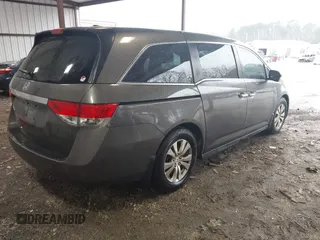 2014 Honda Odyssey EX-L with VIN 5FNRL5H6XEB060090, listed as a IAAI auction lot 41625571 with 112,762 mi miles and . Bid and sale history available at carsss.com. Image 4.