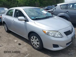 2009 Toyota Corolla with VIN 1NXBU40EX9Z104707, listed as a IAAI auction lot 42379242 with 153,451 mi miles and . Bid and sale history available at DreamBid. Image 1.