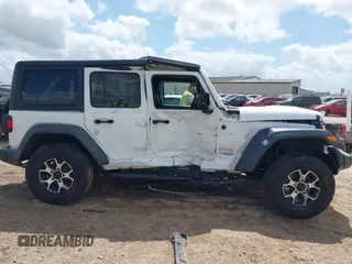 2018 Jeep Wrangler Unlimited Sport S z VIN 1C4HJXDG4JW298647, wystawiony jako IAAI lot #41930817 z przebiegiem 64 761 mil mil oraz . Historia ofert i sprzedaży dostępna na DreamBid. Obrazek 13.