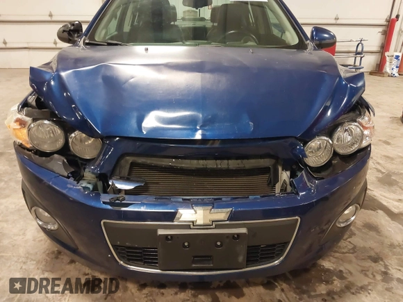 2012 Chevrolet Sonic LTZ z VIN 1G1JE5SB4C4214450, wystawiony jako IAAI lot #42207345 z przebiegiem 120 152 mil mil oraz . Historia ofert i sprzedaży dostępna na DreamBid. Obrazek 6.