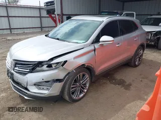2015 Lincoln MKC with VIN 5LMTJ2AH8FUJ23341, listed as a IAAI auction lot 41828159 with 103,562 mi miles. Bid and sale history available at carsss.com. Image 18.
