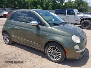 2012 FIAT 500 Lounge with VIN 3C3CFFCR4CT103748, listed as a IAAI auction lot 42590562 with 163,978 mi miles and . Bid and sale history available at DreamBid. Image 1.