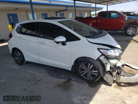 2015 Honda Fit EX-L с VIN 3HGGK5H86FM768802, выставлен на аукционе Copart как лот 58940725 с пробегом Не указан миль и Списание • Salvage title. История ставок и продаж доступна на DreamBid. Изображение 4.