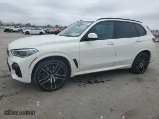 2019 BMW X5 xDrive50i with VIN 5UXJU2C59KLN64967, listed as a Copart auction lot 48978015 with 54,274 mi miles and Salvage Title. Bid and sale history available at carsss.com. Image 1.