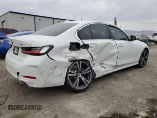 2024 BMW 3 Series 330e with VIN 3MW39FF06R8E35070, listed as a Copart auction lot 42796155 with 3,987 mi miles and Salvage Title. Bid and sale history available at carsss.com. Image 3.
