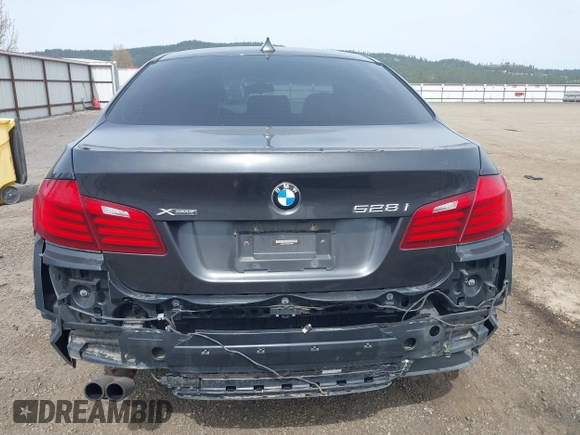 2014 BMW 5 Series 528i xDrive with VIN WBA5A7C55ED617099, listed as a IAAI auction lot 42003348 with 85,262 mi miles and . Bid and sale history available at DreamBid. Image 17.