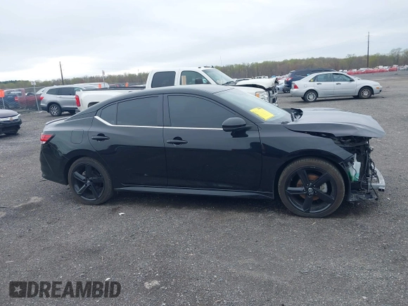 2022 Nissan Sentra SR z VIN 3N1AB8DVXNY307372, wystawiony jako IAAI lot #41958405 z przebiegiem 30 373 mil mil oraz . Historia ofert i sprzedaży dostępna na DreamBid. Obrazek 12.