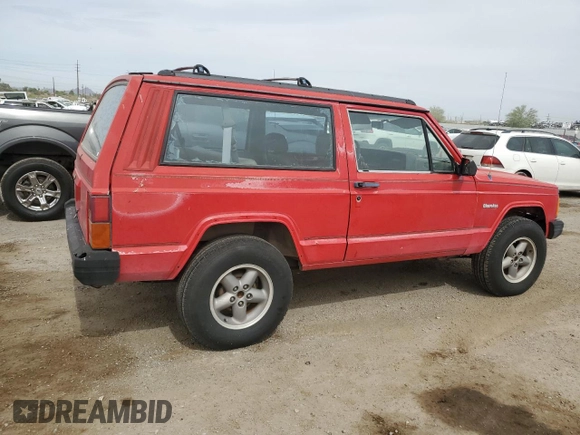 1993 Jeep Cherokee SE with VIN 1J4FT27P2PL619945, listed as a Copart auction lot 59053465 with 222,336 mi miles and Clean title. Bid and sale history available at DreamBid. Image 3.
