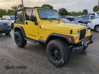 2003 Jeep Wrangler Sport with VIN 1J4FA49S93P373532, listed as a Copart auction lot 74595774 with 105,018 mi miles and Non Repairable. Bid and sale history available at carsss.com. Image 4.