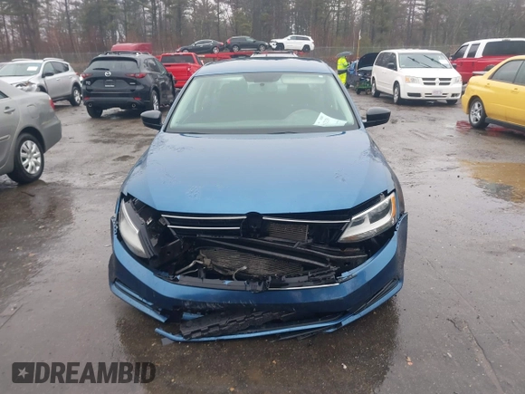 2015 Volkswagen Jetta Sedan 1.8T SE with VIN 3VWD17AJ7FM233634, listed as a IAAI auction lot 41942329 with 128,996 mi miles. Bid and sale history available at carsss.com. Image 12.