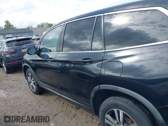 2016 Honda Pilot EX-L with VIN 5FNYF6H5XGB031594, listed as a IAAI auction lot 40409867 with 132,227 mi miles. Bid and sale history available at carsss.com. Image 14.
