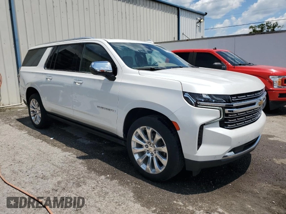2023 Chevrolet Suburban Premier with VIN 1GNSCFKD7PR205475, listed as a Copart auction lot 60704235 with 32,208 mi miles and Clean title. Bid and sale history available at DreamBid. Image 4.