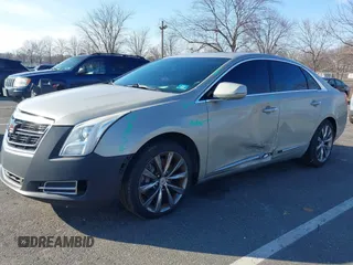 2013 Cadillac XTS Luxury z VIN 2G61R5S31D9185009, wystawiony jako IAAI lot #41243001 z przebiegiem 161 219 mil mil oraz . Historia ofert i sprzedaży dostępna na DreamBid. Obrazek 6.