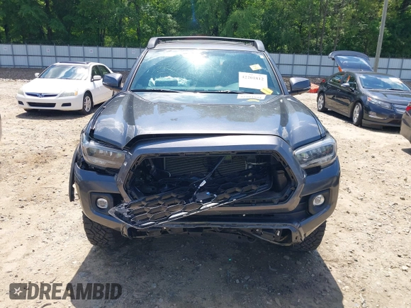 2023 Toyota Tacoma SR with VIN 3TMCZ5AN9PM553246, listed as a IAAI auction lot 42201812 with 20,907 mi miles and . Bid and sale history available at DreamBid. Image 13.