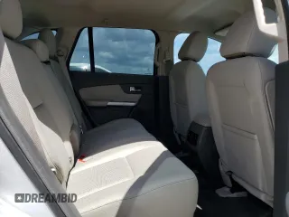 2014 Ford Edge SE z VIN 2FMDK3GC6EBA02608, wystawiony jako Copart lot #61300425 z przebiegiem 139 764 mil mil oraz Szkoda całkowita • Salvage title. Historia ofert i sprzedaży dostępna na DreamBid. Obrazek 11.