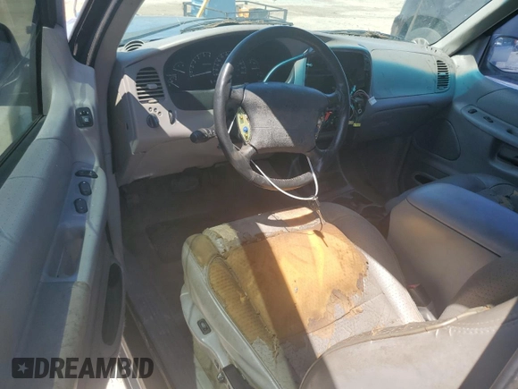 1998 Ford Explorer Sport with VIN 1FMYU22X6WUA20814, listed as a Copart auction lot 68060284 with 180,785 mi miles and Clean title. Bid and sale history available at DreamBid. Image 8.