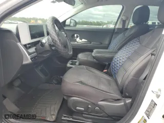 2023 Hyundai IONIQ 5 SE Standard Range with VIN KM8KM4AB3PU138392, listed as a Copart auction lot 74308814 with 0 mi miles and Non Repairable. Bid and sale history available at carsss.com. Image 7.
